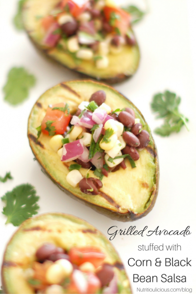 Grilled Avocado Stuffed with Black Bean Salsa by Jessica Levinson RD. Find more recipes and tips on eating for fertility at eatrightmama.com.