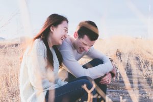Asian couple laughing