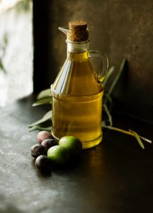 Shop for olive oil and other fats in glass bottles.