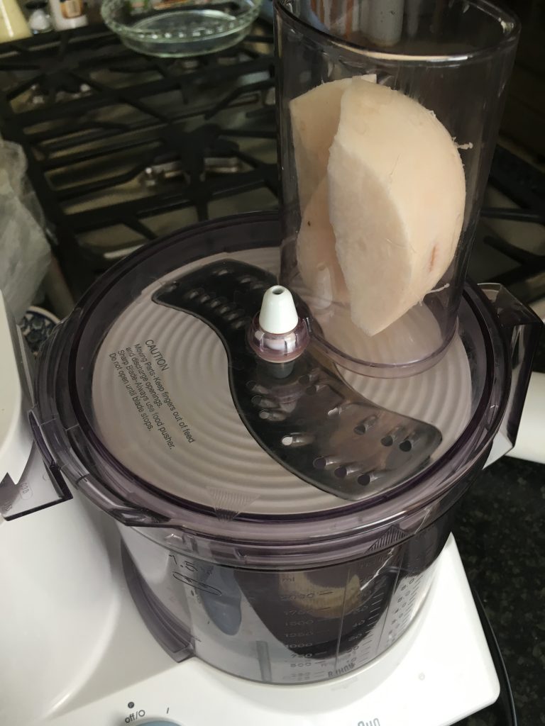 It's easy to grate jicama in the food processor. Check out this recipe from www.eatrightmama.com.